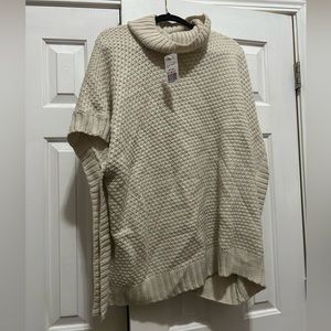 Pullover knit sweater, slit on the sides, arm holes